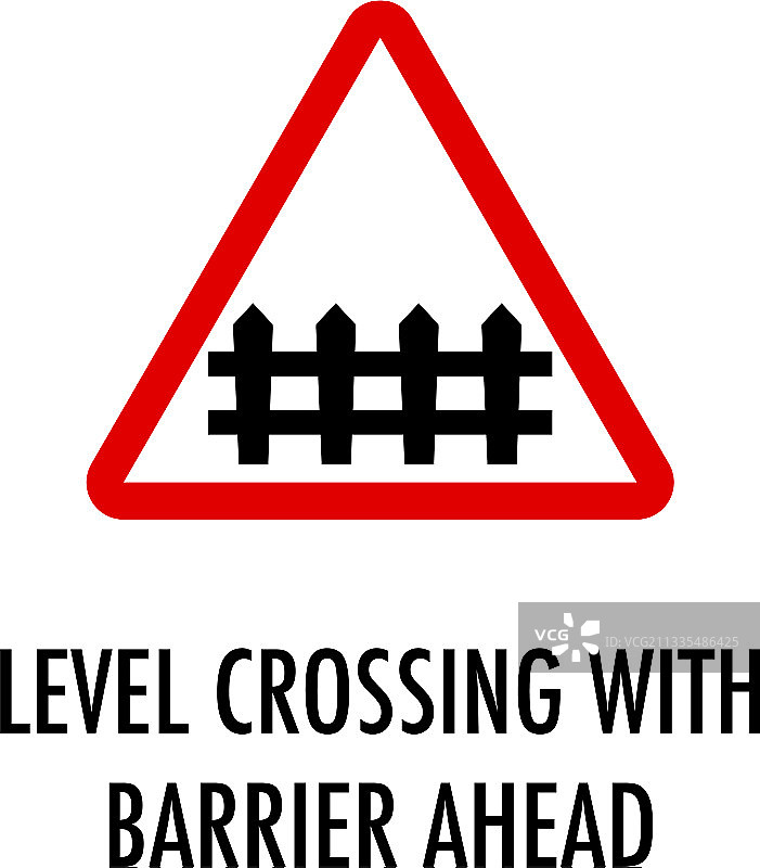 白色路障前方铁路道口标志图片素材