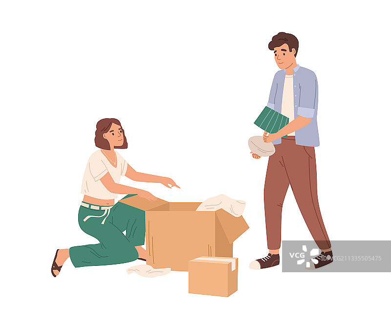 快乐的年轻夫妇打包东西图片素材