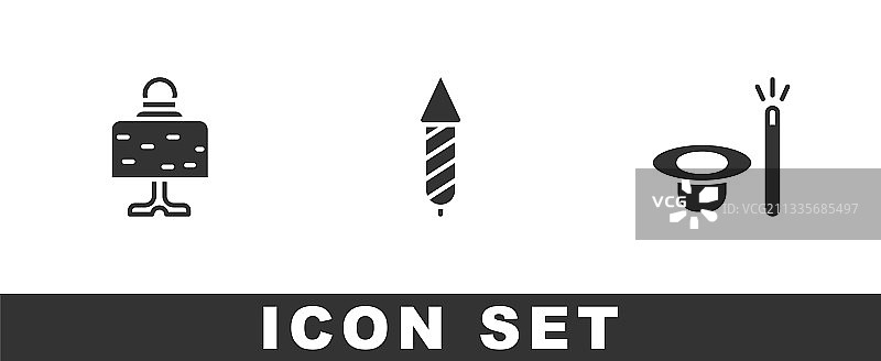 桌子上的魔法水晶球、烟花火箭与帽子合集图片素材