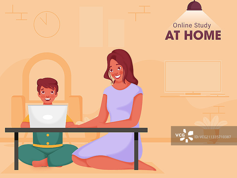 在桌旁用笔记本电脑进行在线学习的可爱男童图片素材