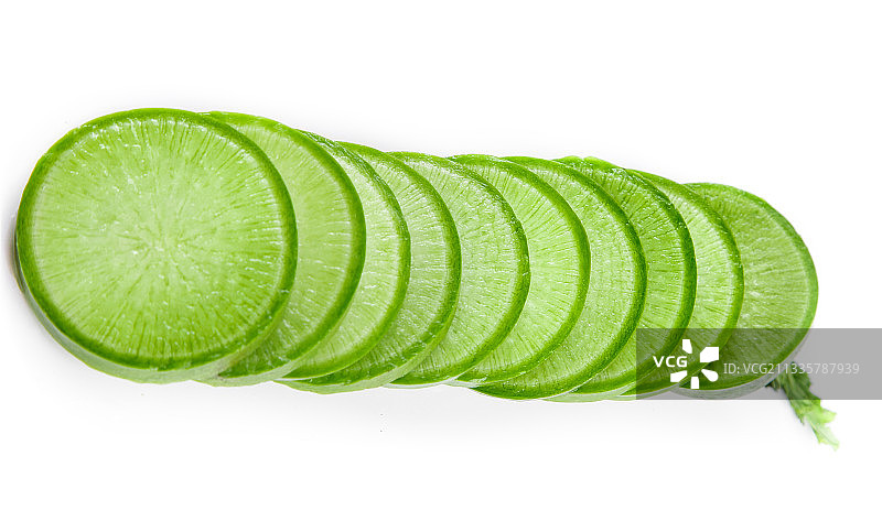 白底上摆放着绿心萝卜图片素材