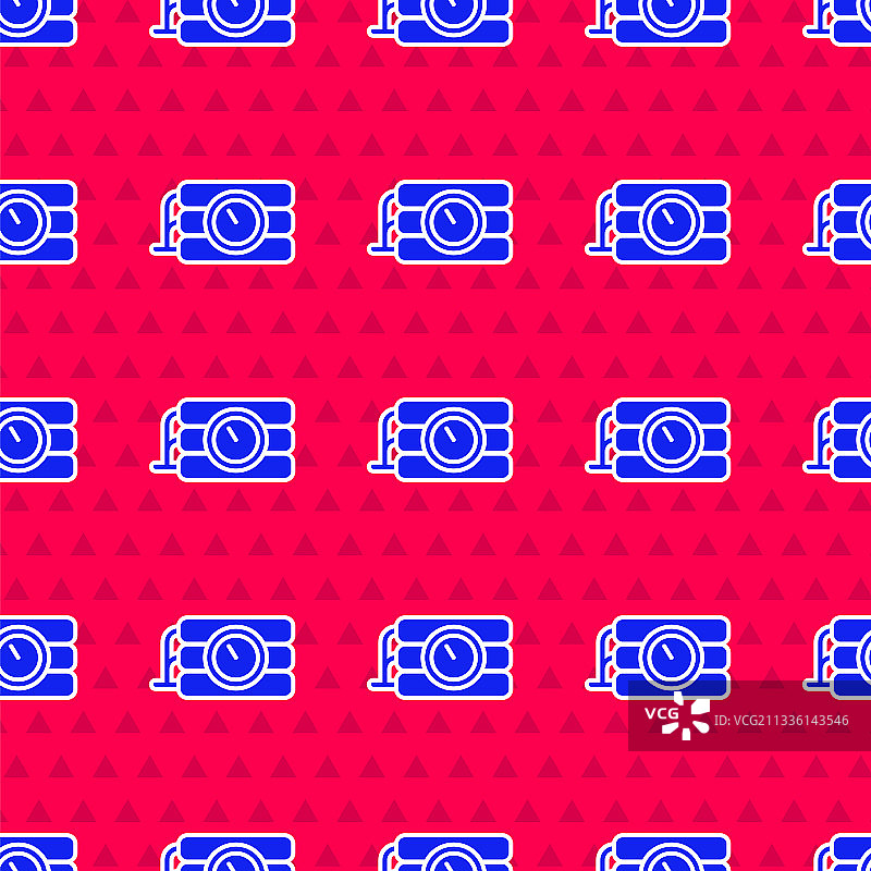 蓝色雷管炸弹和定时器时钟图片素材