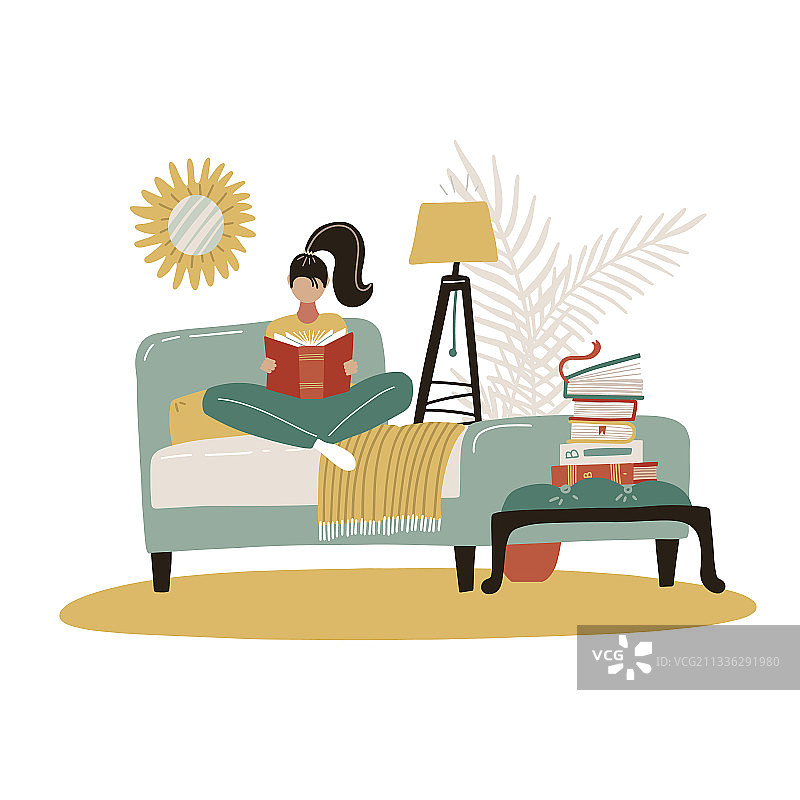 年轻女人在床上放松地读书图片素材