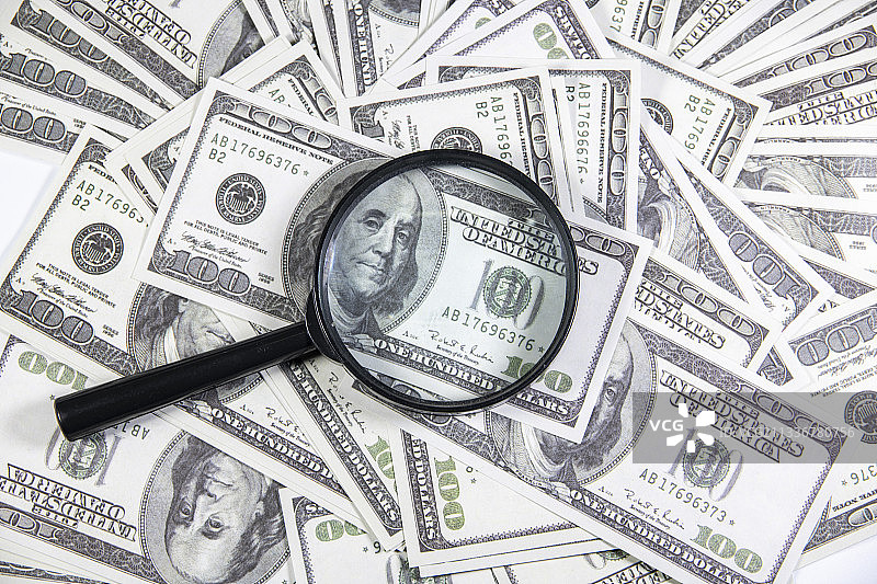 放大镜和美元图片素材