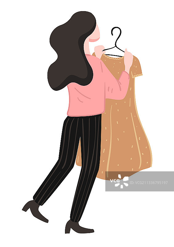 拿着裙子的购物女人图片素材