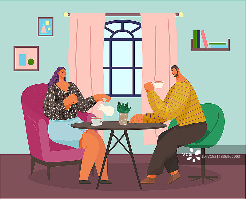 已婚夫妇在家中餐桌旁喝茶图片素材