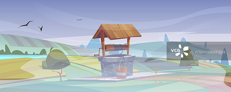 绿山上的旧石井饮用水图片素材