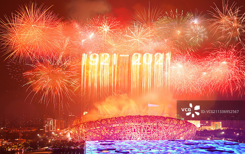 纪念建党100周年北京鸟巢、水立方城市地标建筑烟花图片素材