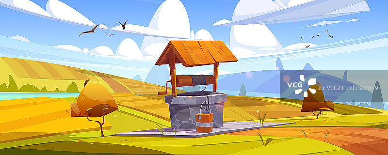 秋日山丘上的饮用水井图片素材