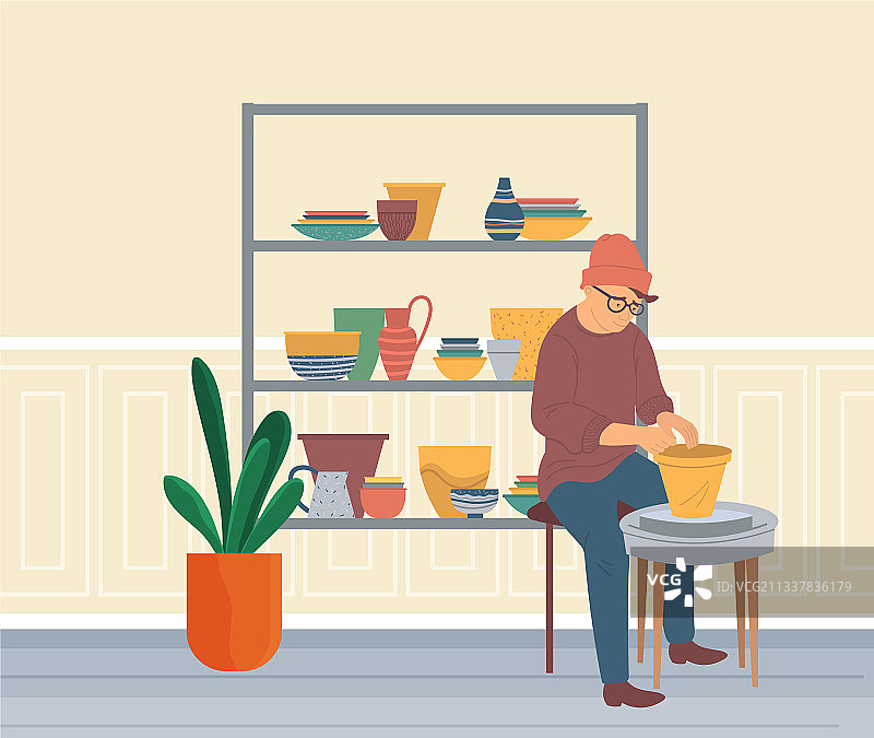 戴眼镜的男人在工作室雕刻陶罐图片素材