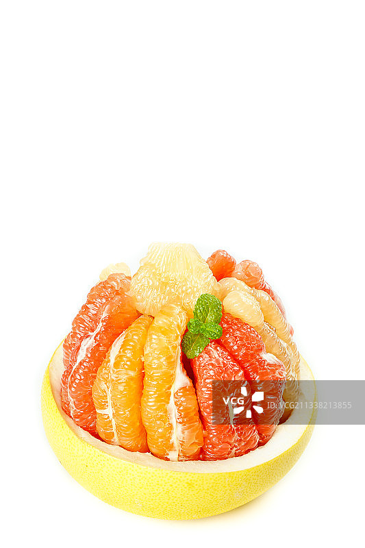 白底上放着三色蜜柚图片素材