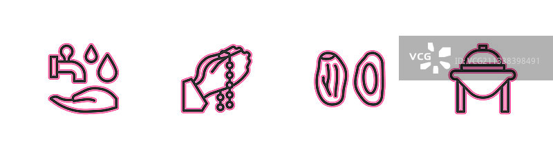 净身、椰枣和祈祷的手图片素材