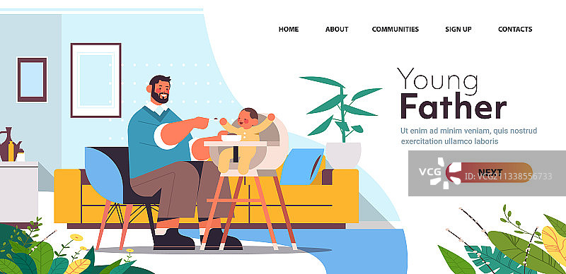 父亲在儿童餐椅上喂他的小儿子图片素材