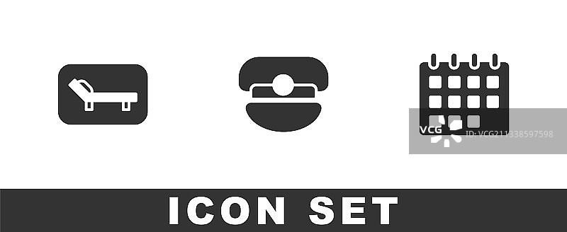 日光浴床雨伞船长帽和日历图片素材