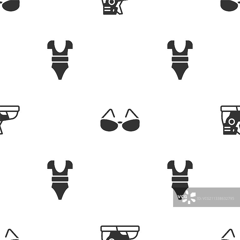 运动器材套装：运动鞋、眼镜和泳衣图片素材