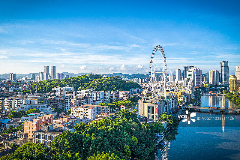 摩天轮下晨曦城景图片素材