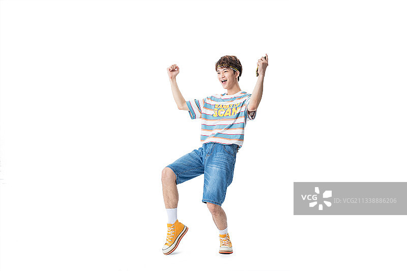 伸出手去追逐的年轻男生图片素材