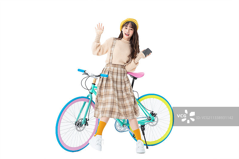 骑车的年轻女学生图片素材