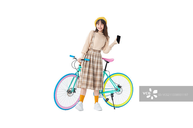 骑车的年轻女学生图片素材