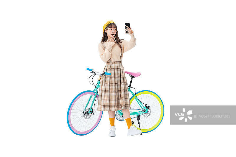 骑车的年轻女学生图片素材