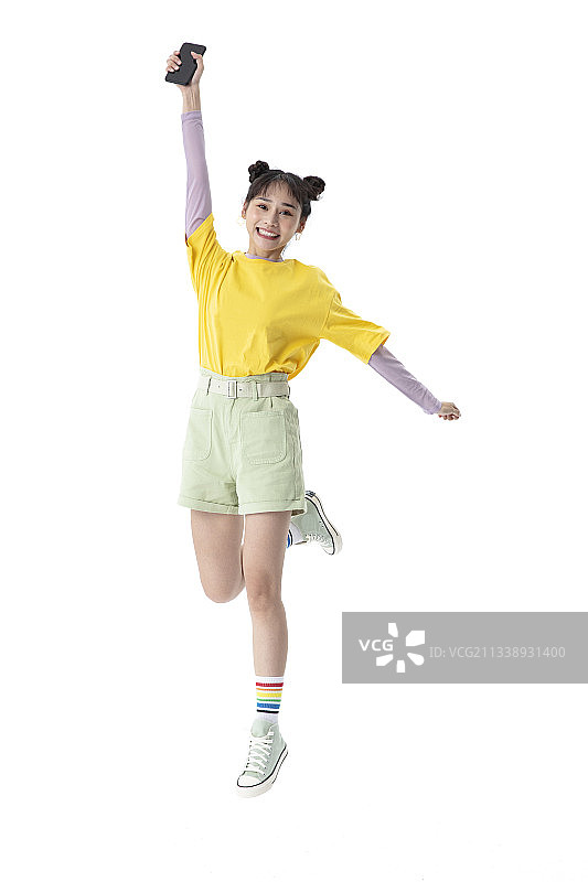 跳跃的年轻女孩图片素材