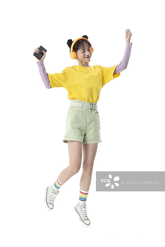 跳跃腾空的年轻女性图片素材