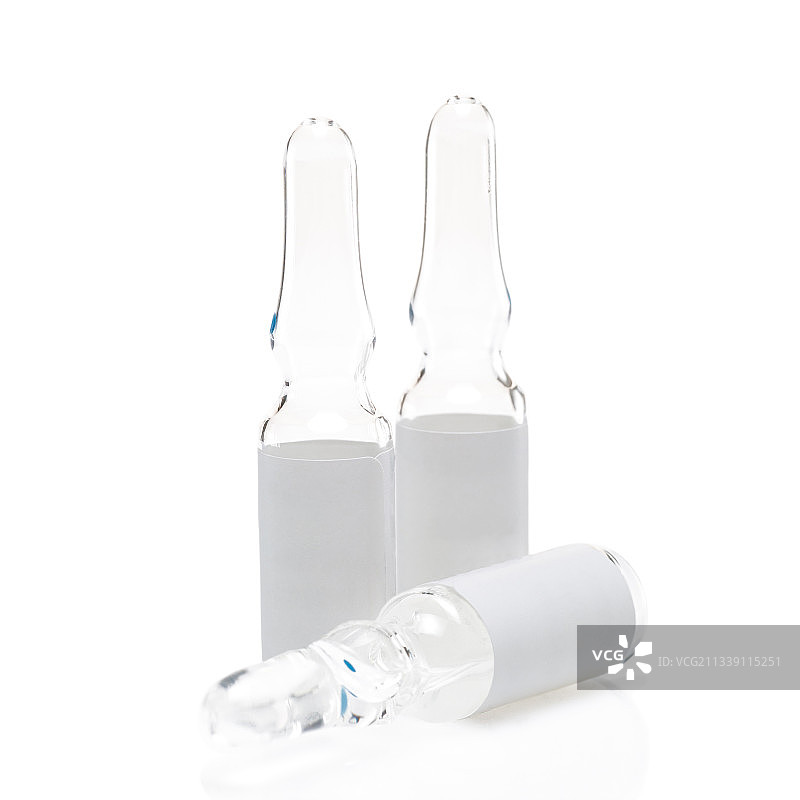 白色背景上分离的玻璃安瓿瓶装疫苗图片素材