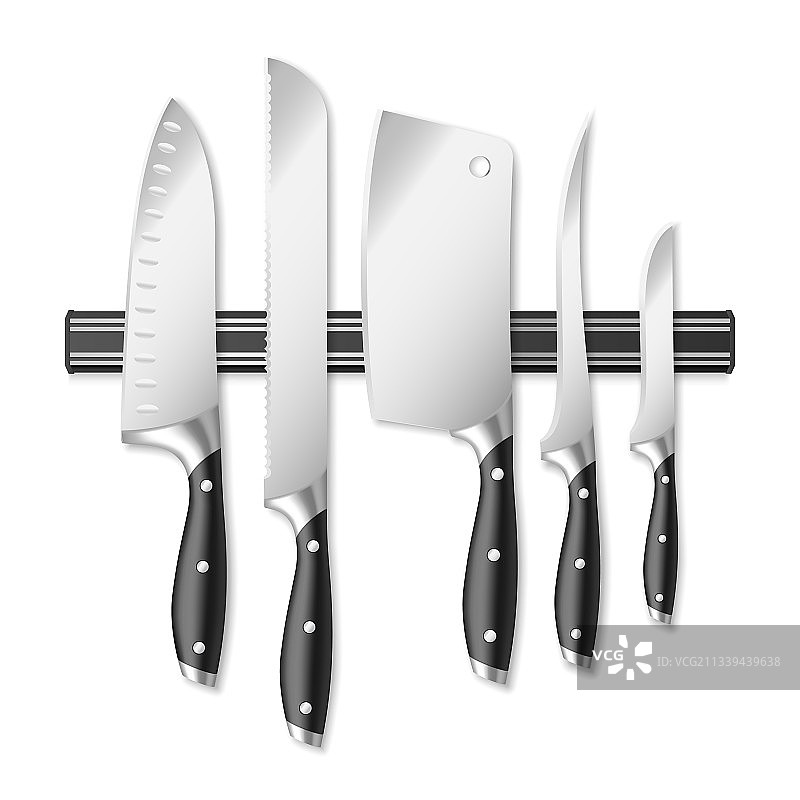 磁性刀架上的厨房刀具图片素材