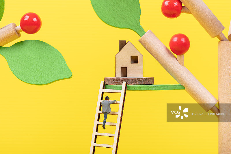 微缩创意积木红果叶子上的房子树屋与梯子图片素材
