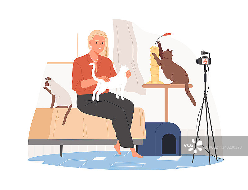 兽医博主与猫咪在镜头前图片素材