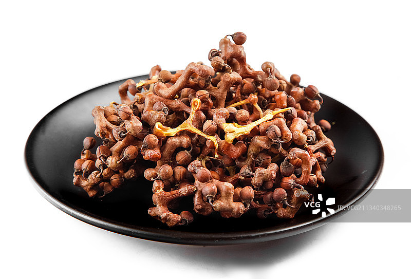 盘子里装着万寿果图片素材