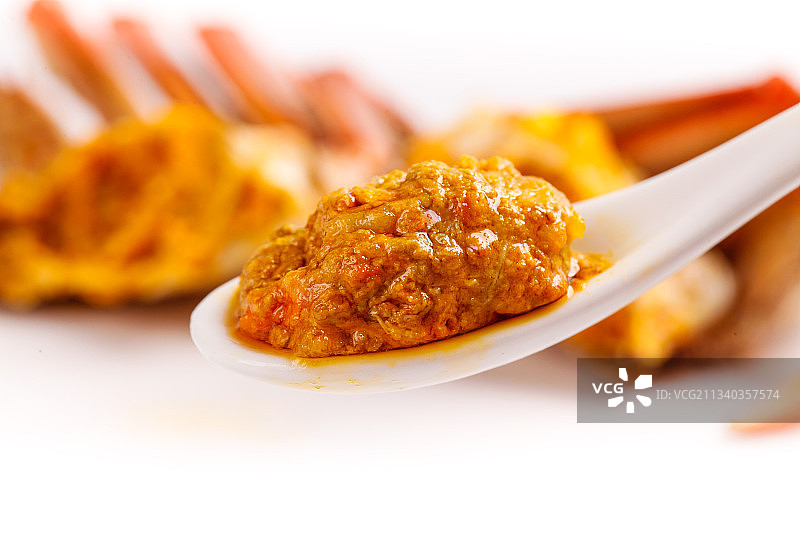 勺子里的蟹黄图片素材