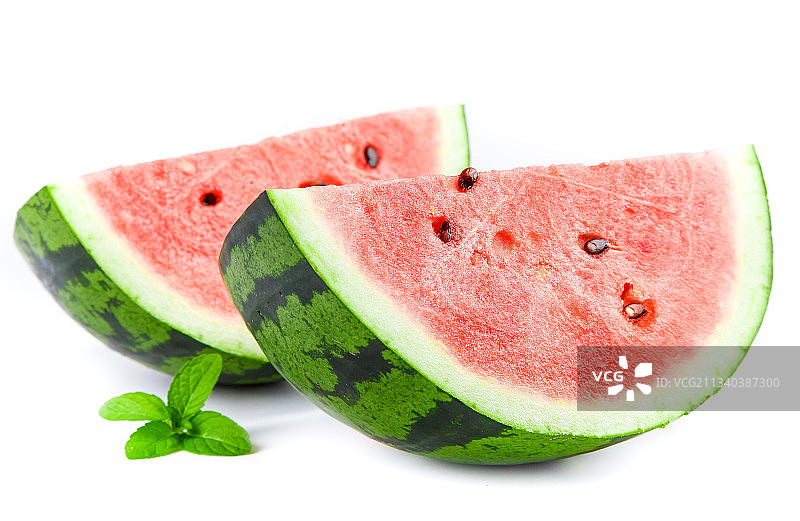 切开的麒麟西瓜放在白底上图片素材