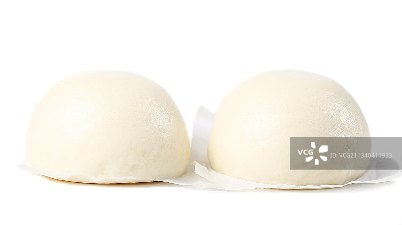 白底上的奶黄馅包子图片素材