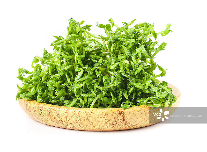 盘子里装着豌豆芽菜图片素材