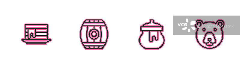 成摞的薄烤饼、蜂蜜罐和木制餐具图片素材