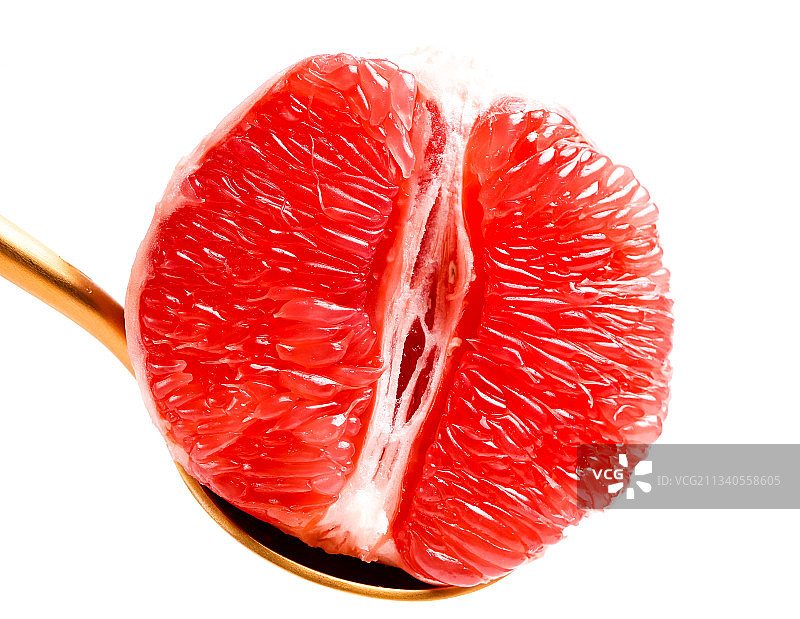 勺子上放着柚子图片素材