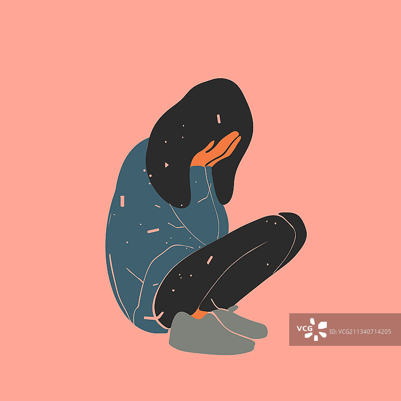 悲伤哭泣的女孩蹲在地板上图片素材