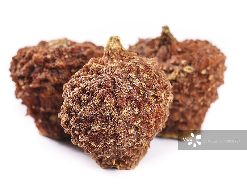 白底上的野生刺梨干果图片素材