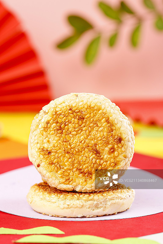 彩底上的手工芝麻饼图片素材