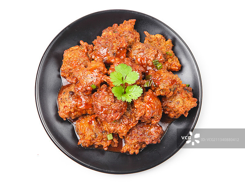 盘子里装着红烧藕圆子图片素材