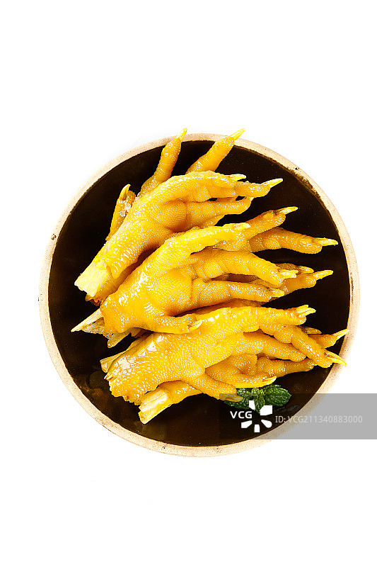 盘子里装着盐焗鸡爪图片素材