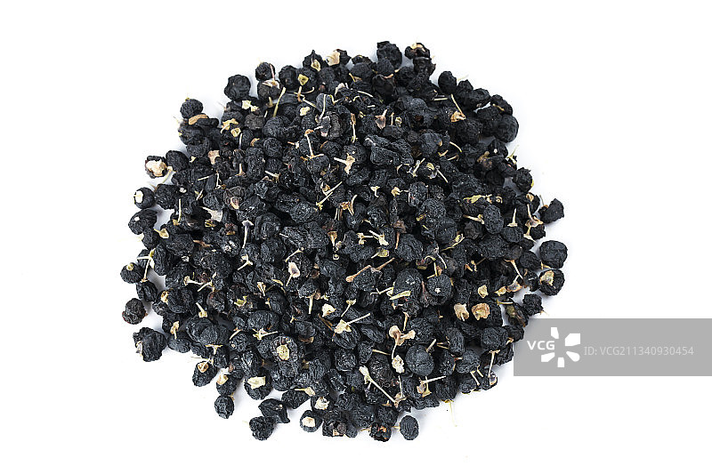 白底上摆放着黑枸杞图片素材