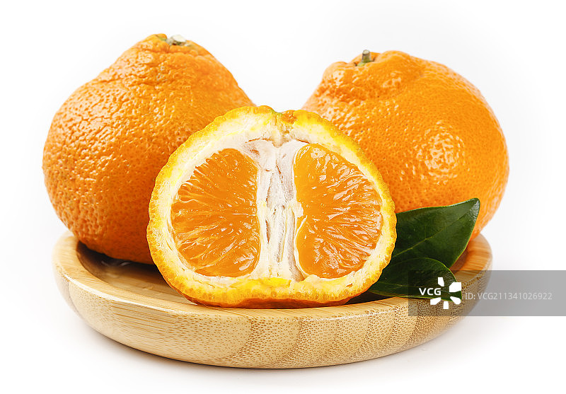 盘子里的春见耙耙柑图片素材