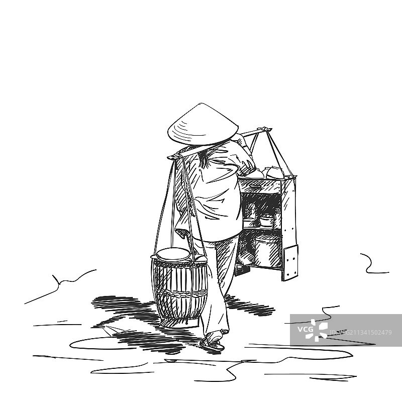 戴越南斗笠挑担的女人图片素材