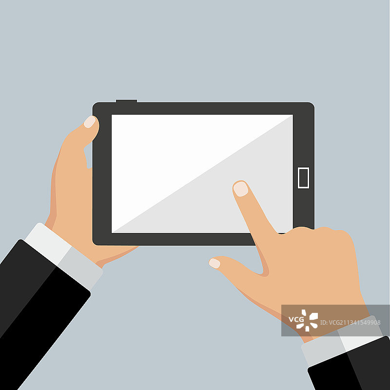 灰色背景上手持电脑图片素材