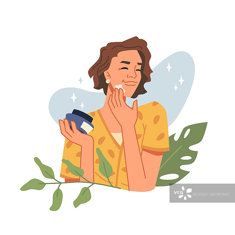 年轻女人使用天然精华化妆品图片素材