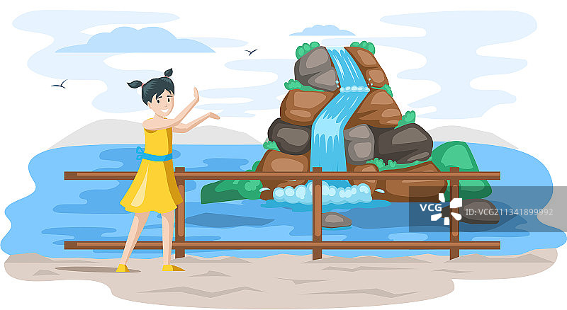 小女孩站在山区瀑布旁图片素材