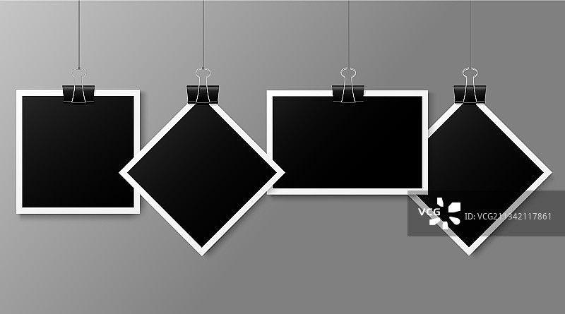 用金属夹子固定的绳索上的四张照片图片素材