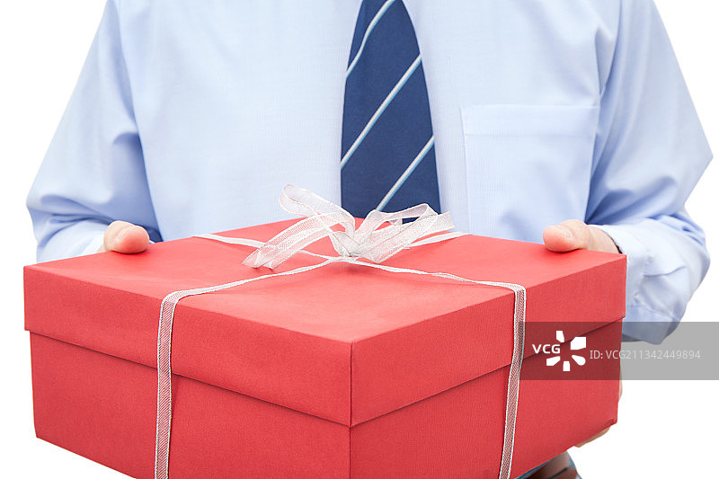 商人拿着礼品盒，背景为白色图片素材